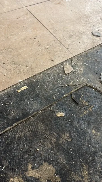 Black bitumen mastic floor removal in a SE27 flat